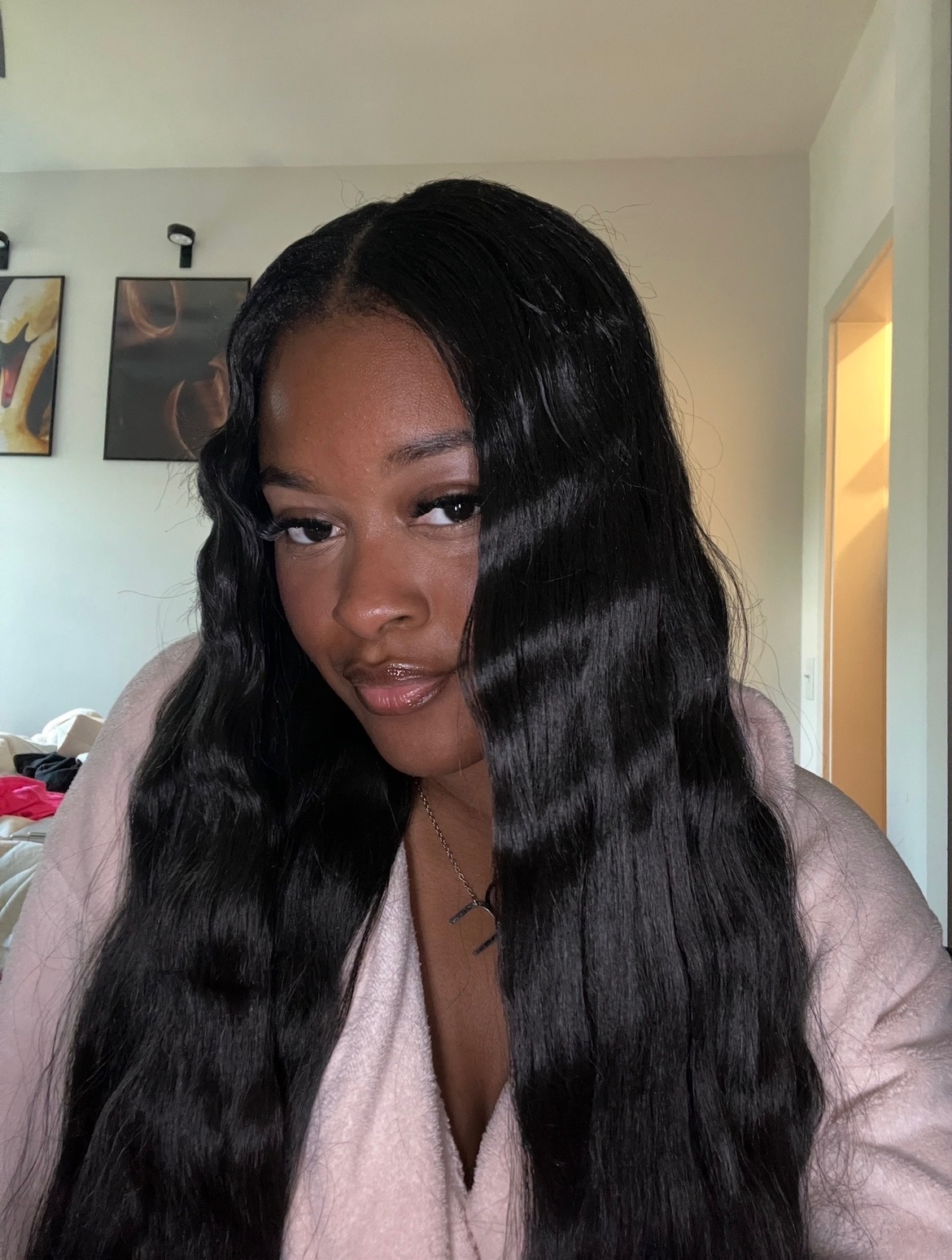 Kiy, the stylist behind Pretty Tressed, with long dark hair